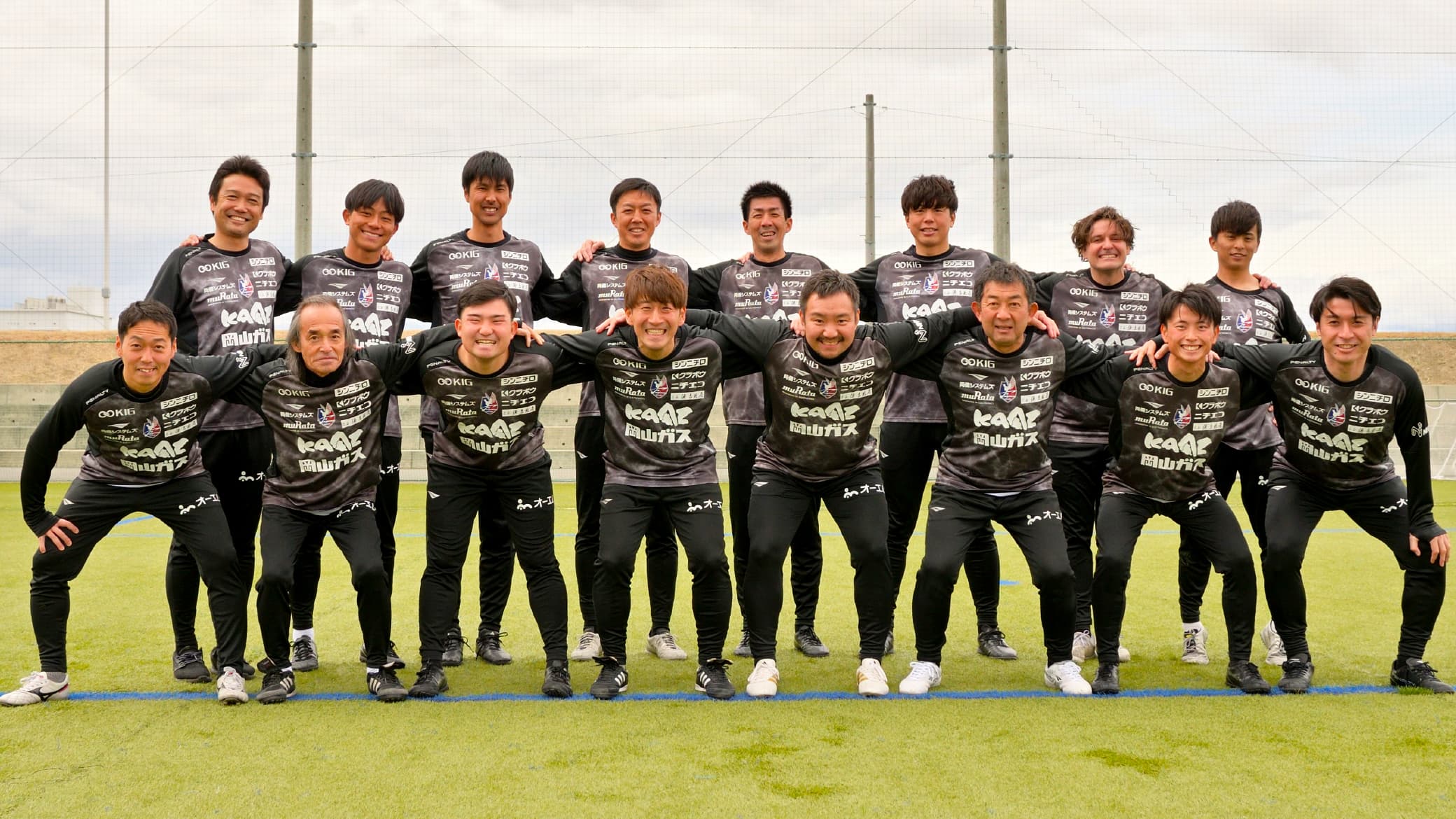 コーチの集合写真